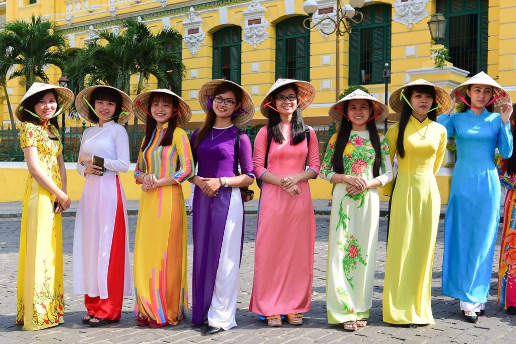 The Vietnamese Ao Dai is world-famous for its unique design, which enhances the existing beauty of women, making them even more attractive.(Traditional Vietnamese Gifts)